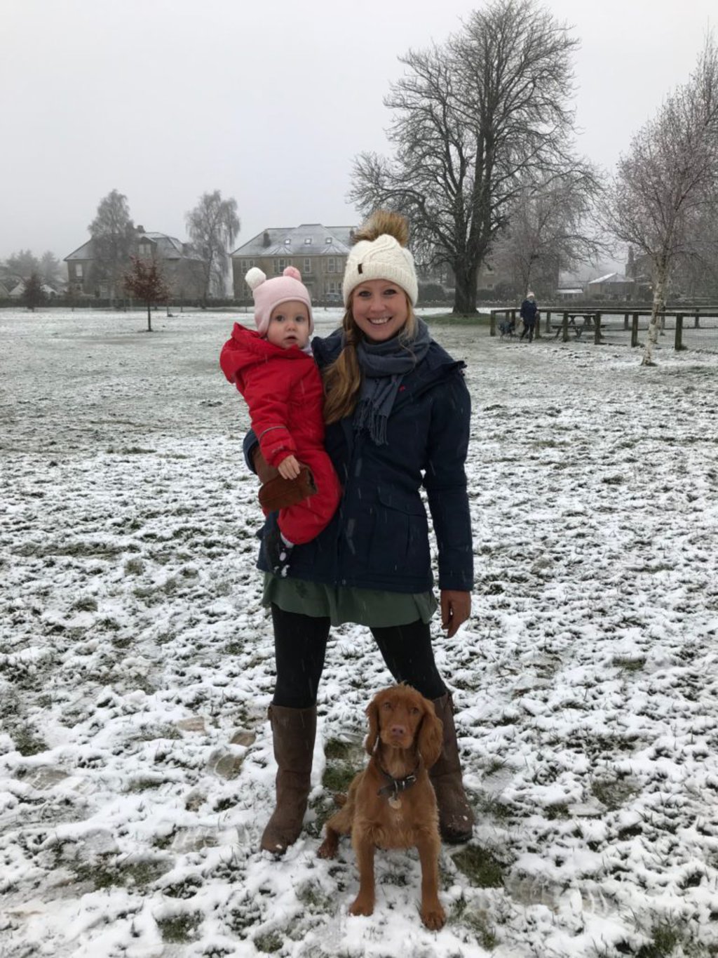 woman with bay and dog 