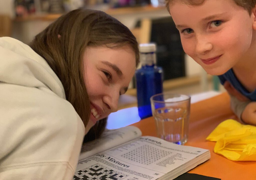 Kids doing crossword 